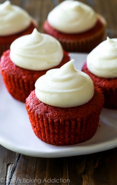 Classic Red Velvet Cupcakes with Cream Cheese Frosting - learn what makes this classic recipe so good! sallysbakingaddiction.com