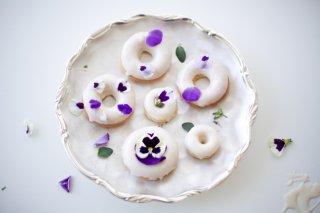 Pretty Decorated Doughnuts on a Cake Stand