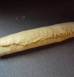 rolling dough for cinnamon rolls