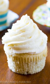 The BEST homemade vanilla cupcakes. Easy to make and full of rich, buttery vanilla flavor. Recipe by @sallybakeblog