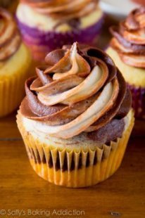 Ultimate Marble Cupcakes! Chocolate and vanilla swirled frosting on top of chocolate and vanilla swirled homemade cupcakes!